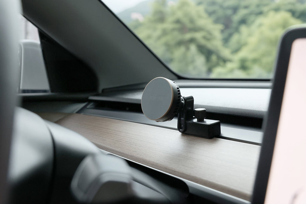 Active cooling MagSafe wireless car mount with vent clip attached to a Tesla dashboard — view 2