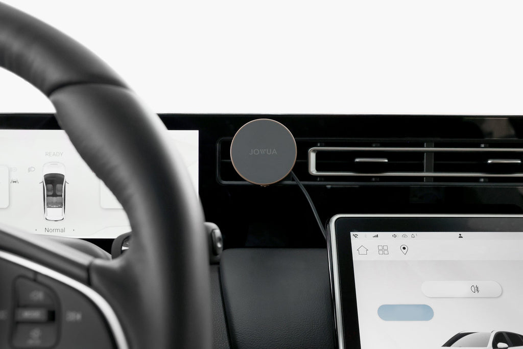 Active cooling MagSafe car mount attached to air vent with a smooth silicone surface. — view 2