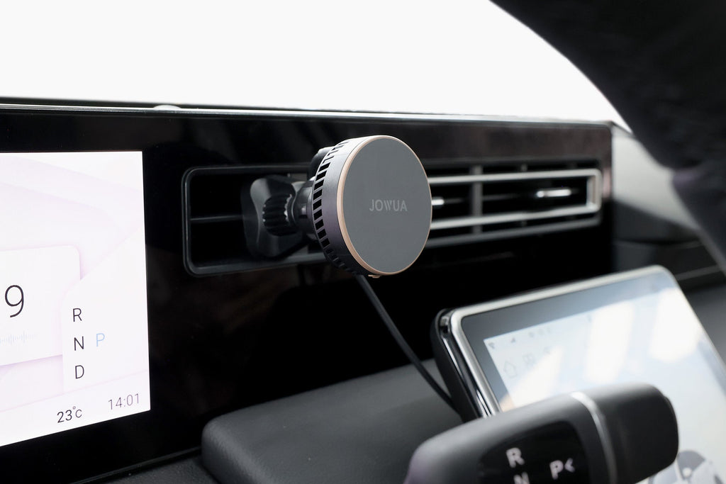 Active cooling MagSafe car mount attached to air vent with a smooth silicone surface. — view 3