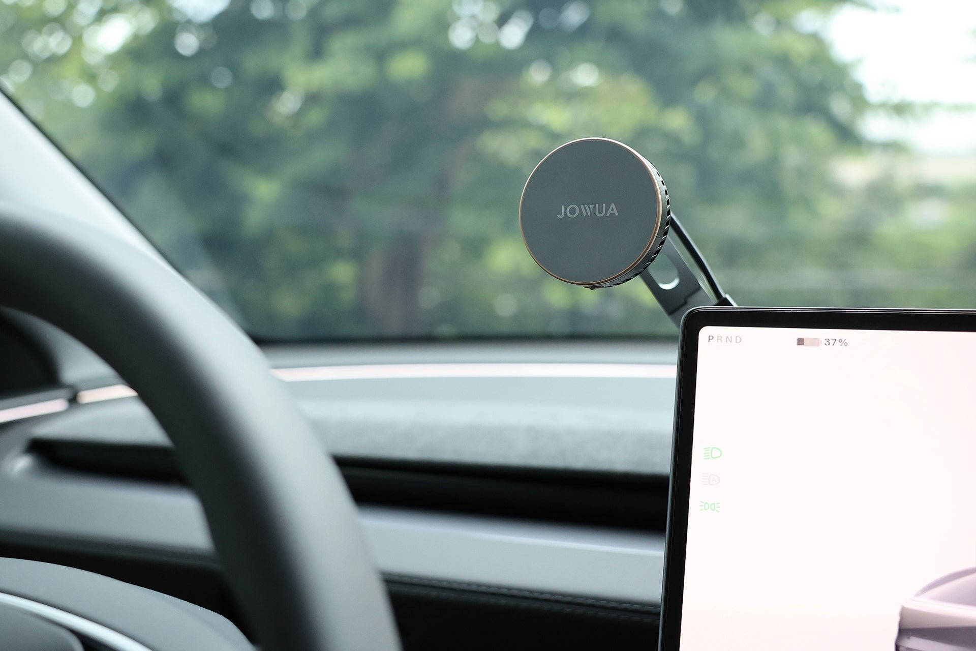 Active cooling car phone mount with premium metal arm and sleek black silicone charging pad — view 2