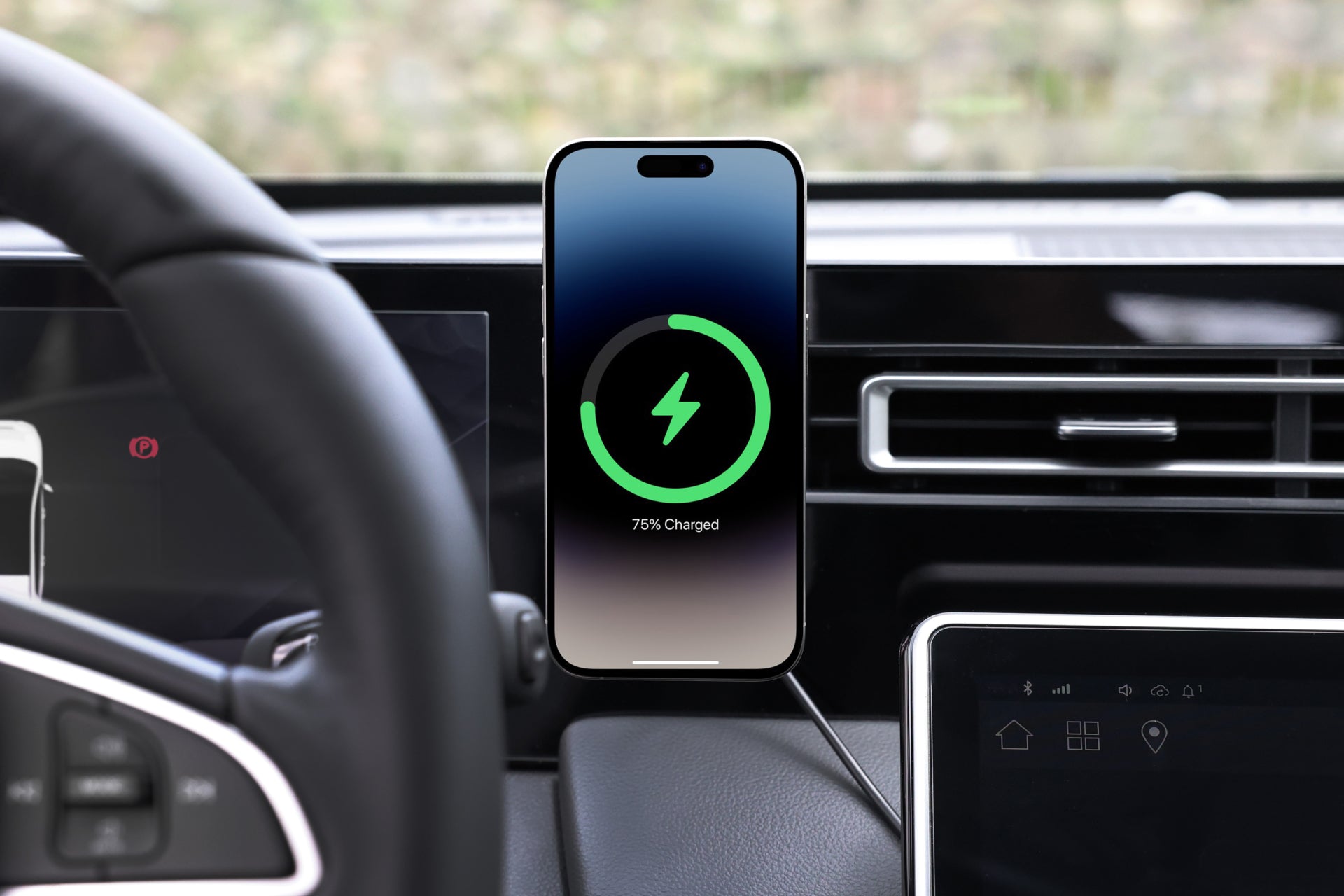 Active cooling MagSafe car mount attached to air vent with a smooth silicone surface. — view 5