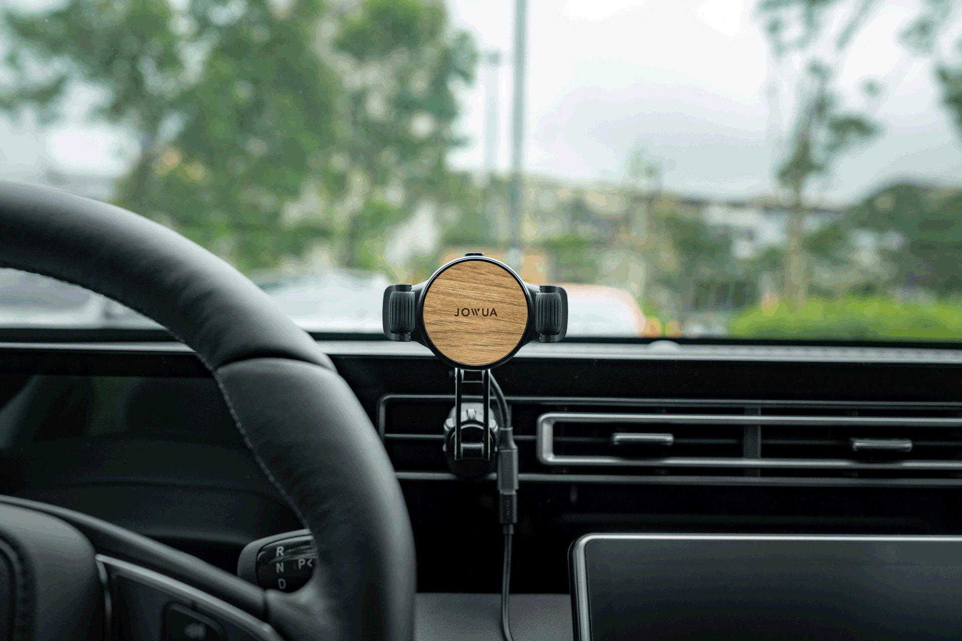 Universal Qi2 wireless car air vent mount with silicone roller clamps and adjustable arm — view 2