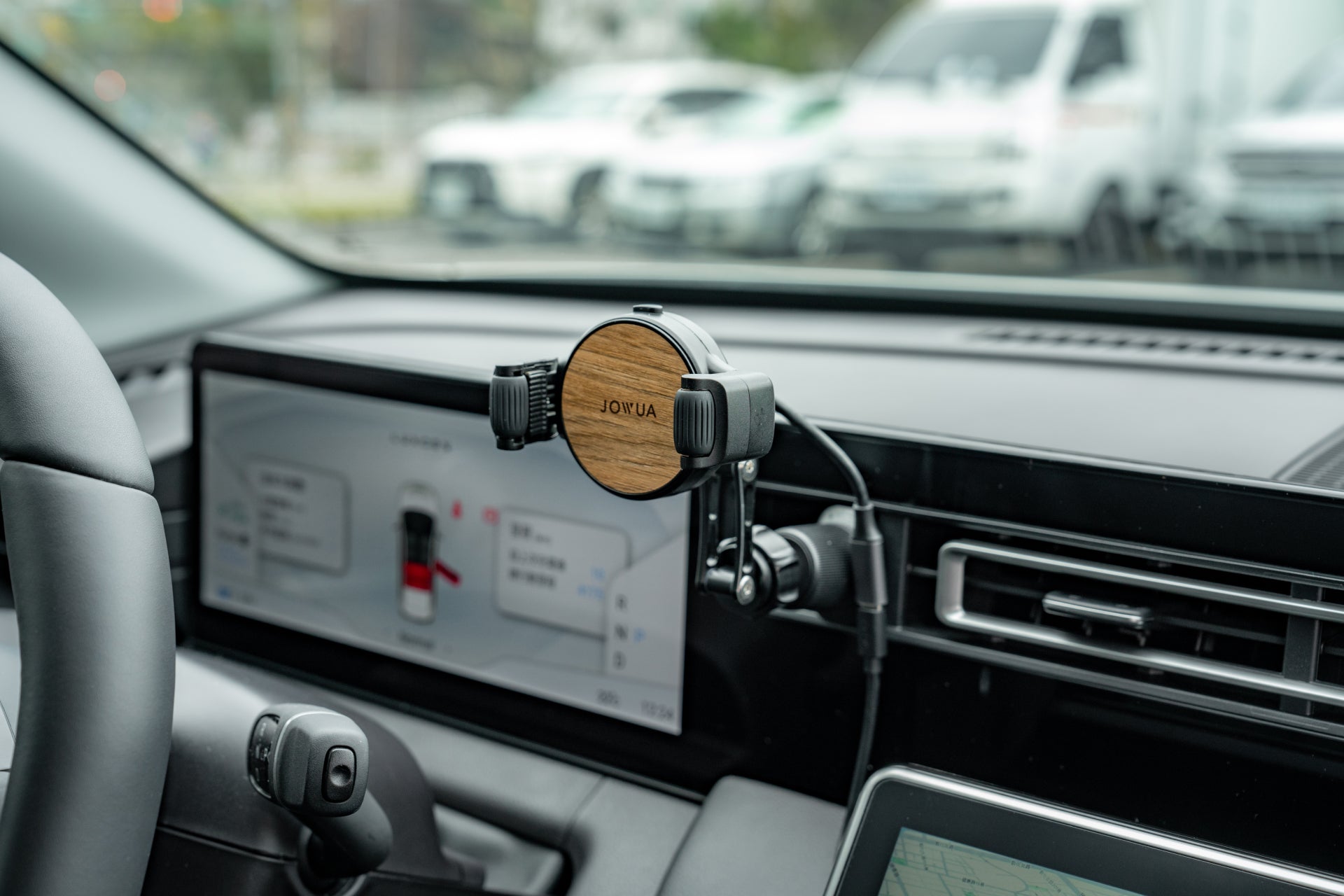 Universal Qi2 wireless car air vent mount with silicone roller clamps and adjustable arm — view 5