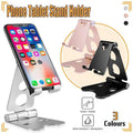 Adjustable aluminum desktop stand for phones and tablets featuring anti-slip silicone pads and charging hole