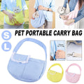 Blue canvas crossbody cat carrier bag with wide shoulder strap and secure internal safety hook