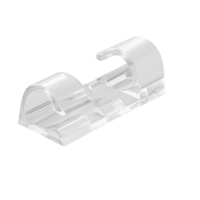 Set of twenty self-adhesive plastic cable management clips organizing power cords on a wooden desk — view 2