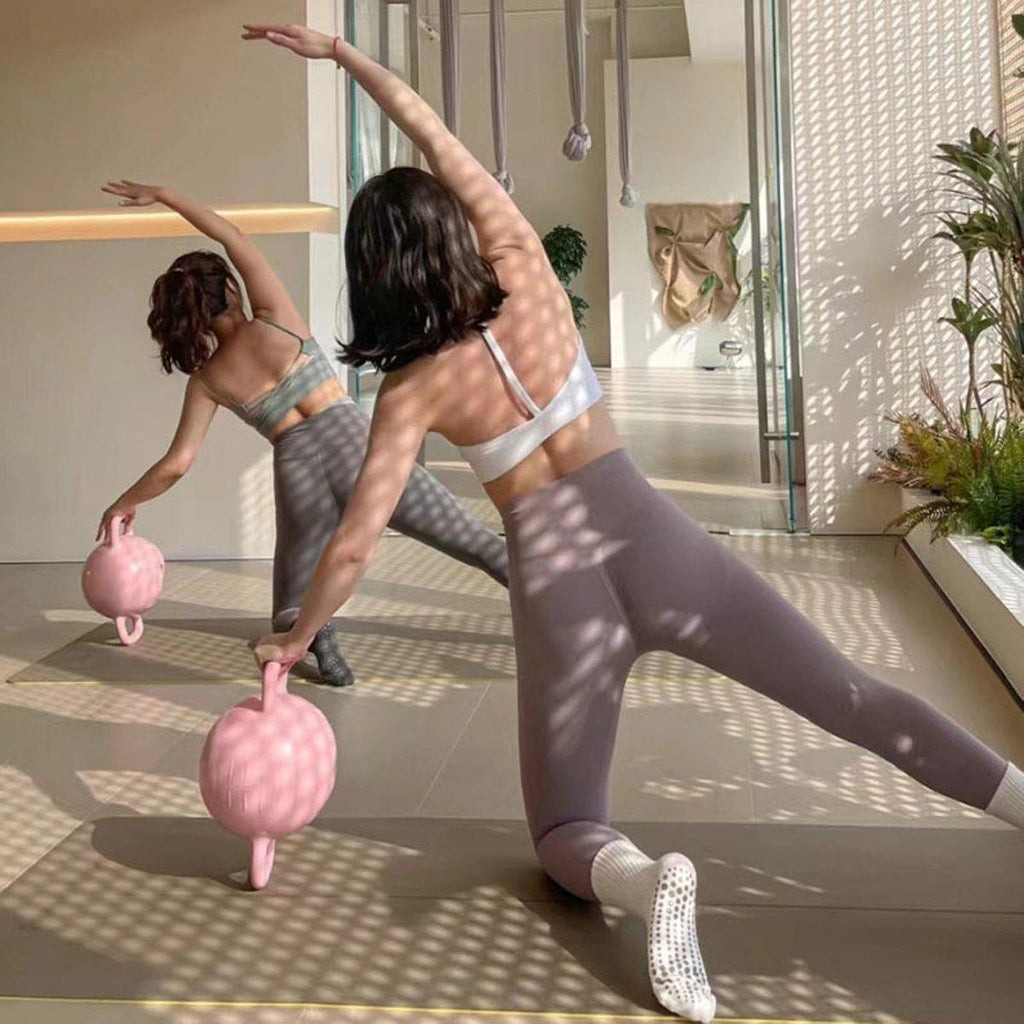 Adjustable water-filled double handle kettlebell for Pilates and yoga in vibrant pink colour — view 4
