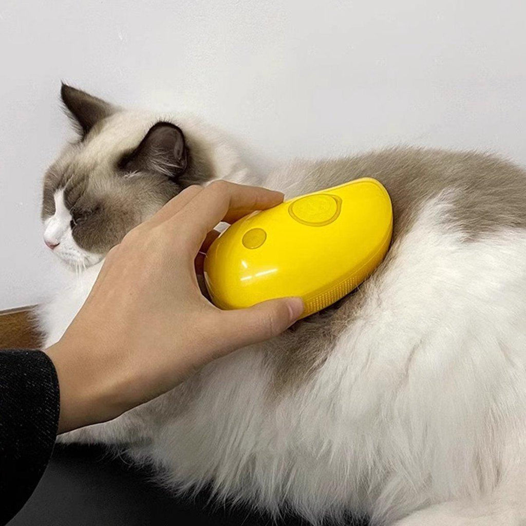 Electric pet hair brush in yellow and green with soft teeth and misting spray function — view 5
