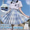 Women's high waist pleated plaid skirt in classic school uniform style on a model