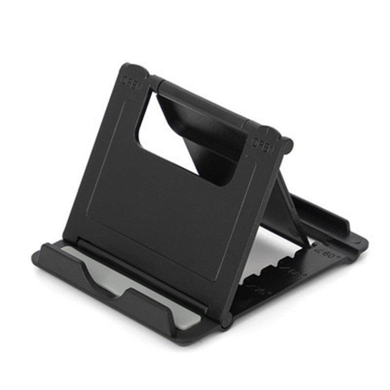 Adjustable foldable device stand made of durable plastic supporting a smartphone or tablet. — view 2