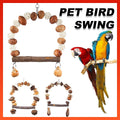 Natural wood parrot chew toy with hanging hook for beak grinding and active cage climbing