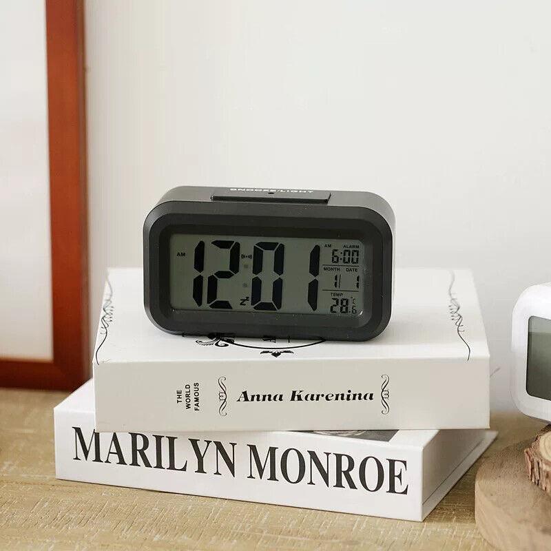 Modern digital bedside alarm clock with temperature display and LED night light in crisp white. — view 5