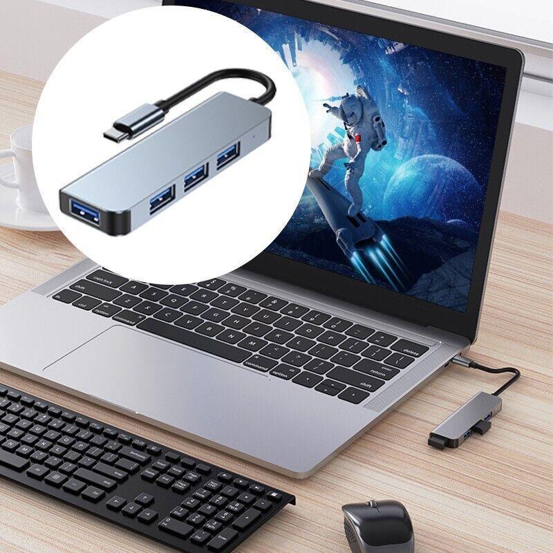 Space grey multi-port USB-C hub adapter for laptops featuring HDMI, USB, and memory card slots. — view 4