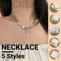 Silver titanium steel clavicle chain necklace featuring a cool tone coloured glaze moonstone pendant
