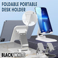 Adjustable foldable tablet stand in silver aluminum securely holding a mobile phone on a desk