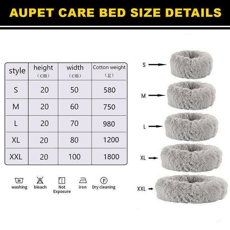 Round plush calming pet bed in soft grey with a fluffy donut shape for dogs. — view 3