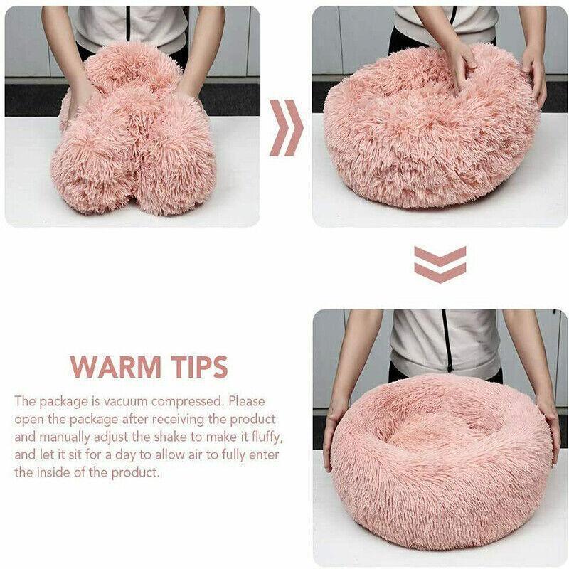 Calming plush round pet bed in soft fabric with waterproof base and washable zipper cover — view 5