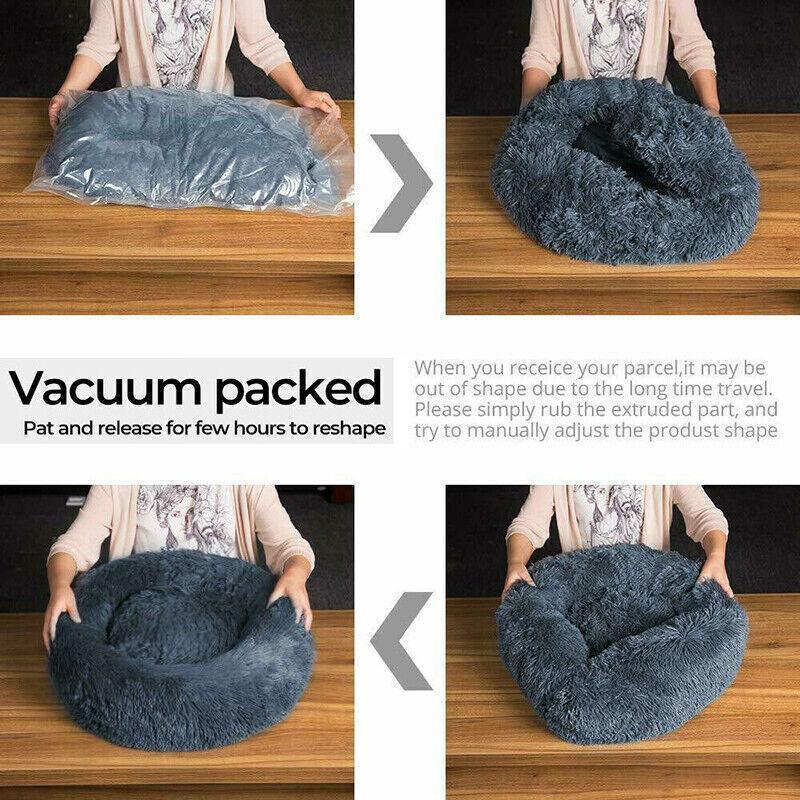 Calming plush round pet bed in soft fabric with waterproof base and washable zipper cover — view 4