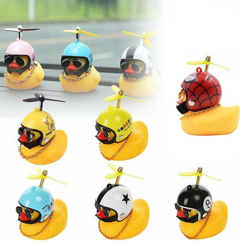 Yellow rubber duck dashboard ornament with helmet and light up feature for cars and bicycles. — view 5