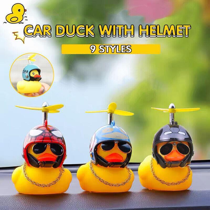 Yellow rubber duck dashboard ornament with helmet and light up feature for cars and bicycles. — view 4