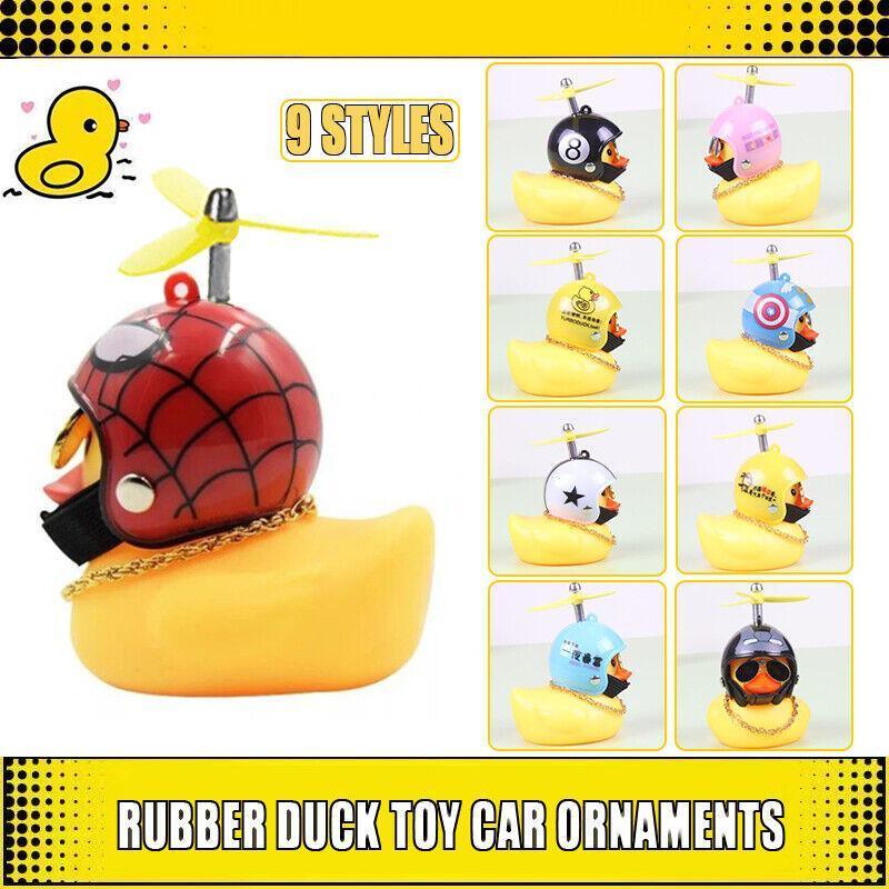 Yellow rubber duck dashboard ornament with helmet and light up feature for cars and bicycles. — view 3