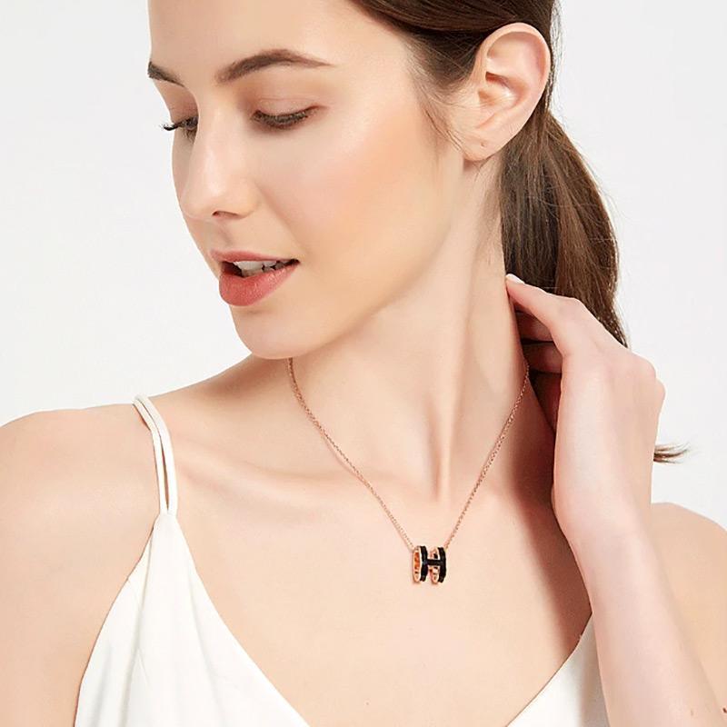 Oval enamel letter necklace in rose gold delicate clavicle chain with vibrant H initial pendant — view 5