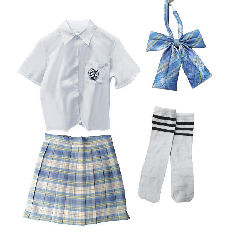 Women's high waist pleated plaid skirt in classic school uniform style on a model — view 2