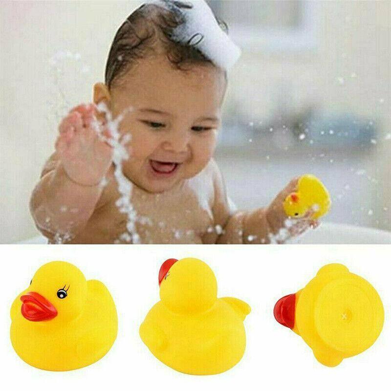 Classic yellow squeaky rubber duck bath toys for toddlers designed for floating water play — view 3