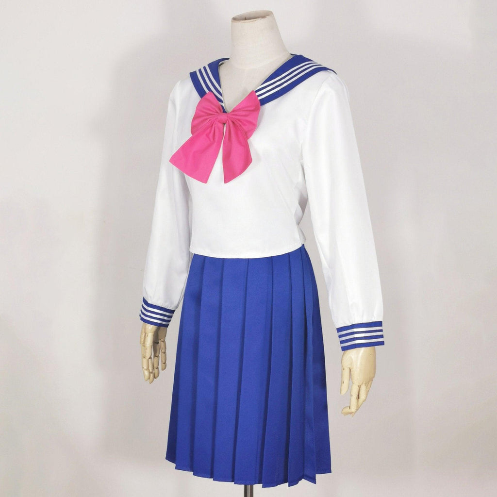 Sailor Warrior anime cosplay costume with navy pleated skirt, white bodice, and red bow. — view 5