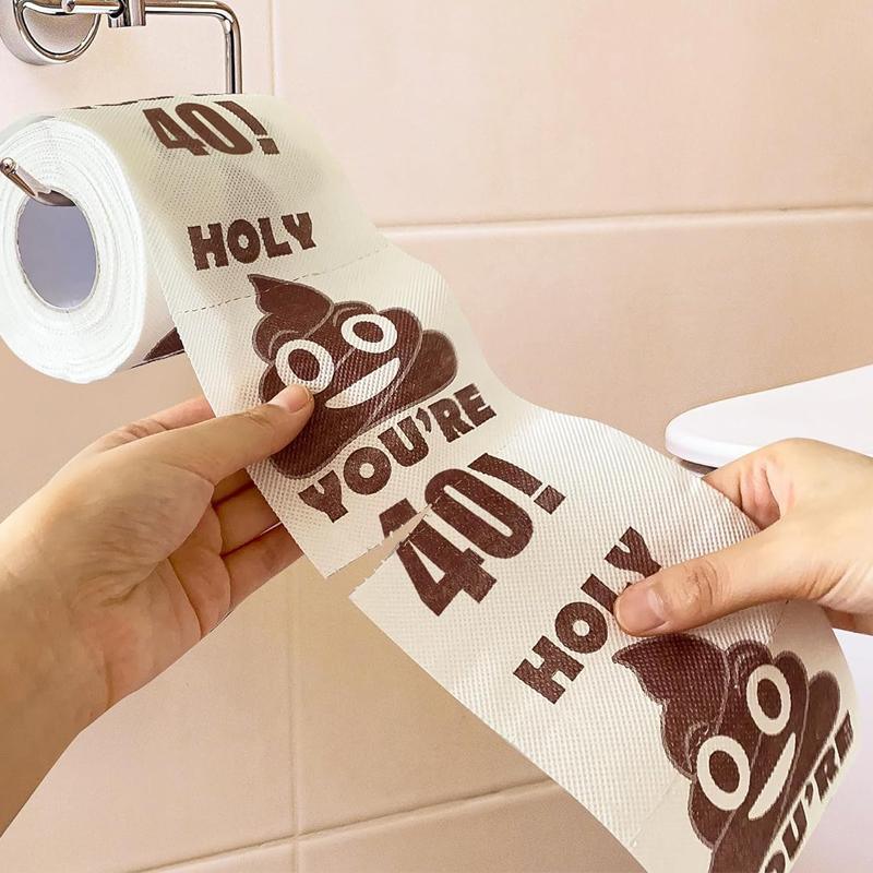 Funny milestone birthday toilet paper roll featuring a brown printed poop emoji on white paper. — view 5