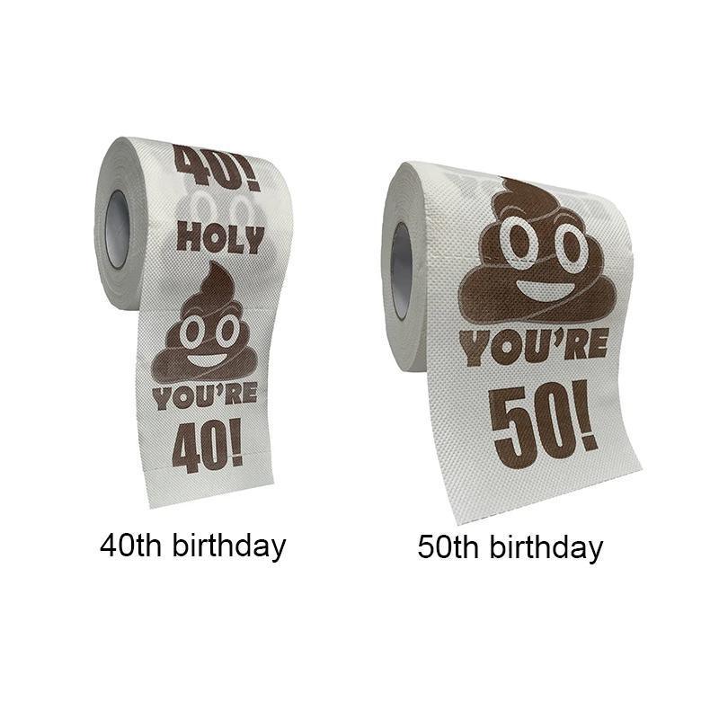 Funny milestone birthday toilet paper roll featuring a brown printed poop emoji on white paper. — view 4