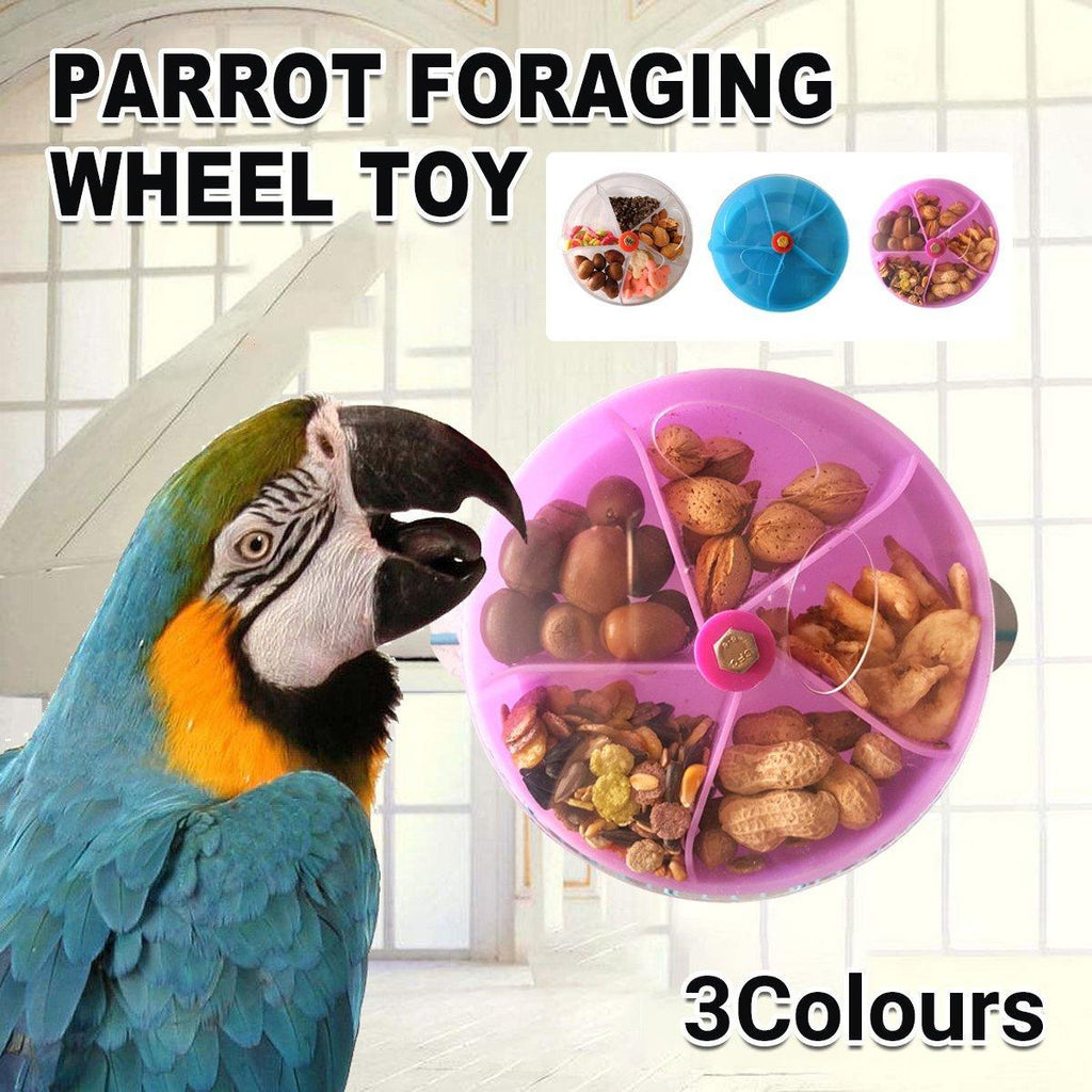 Interactive parrot foraging wheel toy in purple, mounted securely to a bird cage with clear compartments