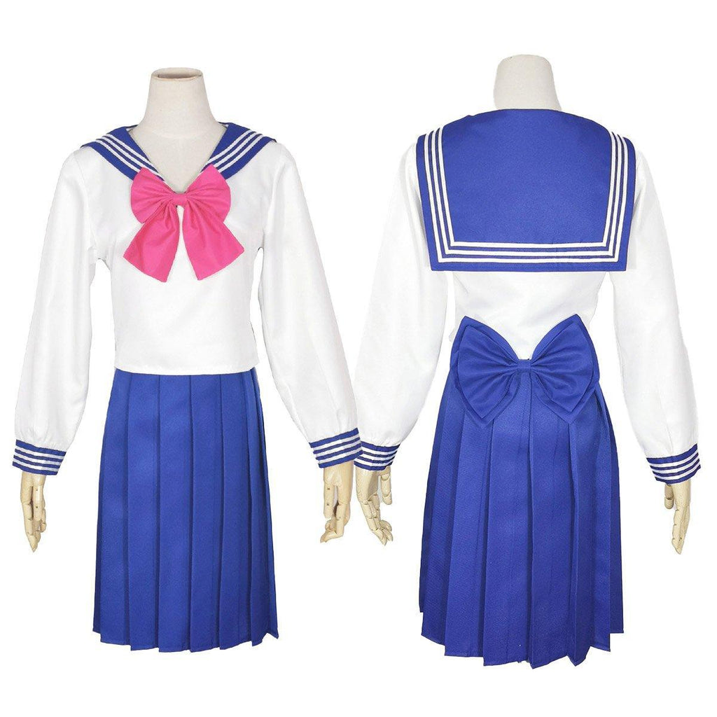 Sailor Warrior anime cosplay costume with navy pleated skirt, white bodice, and red bow. — view 2