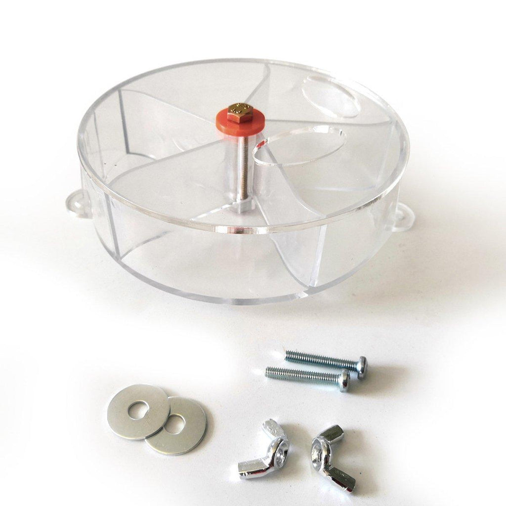 Interactive parrot foraging wheel toy in purple, mounted securely to a bird cage with clear compartments — view 4