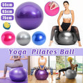 Textured anti-burst inflatable yoga ball in solid color with foot pump for home fitness workouts
