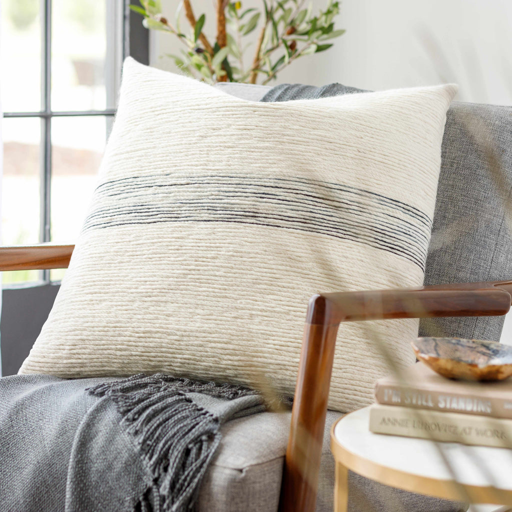 Woven wool and cotton contemporary throw pillow cover featuring ivory, black, and charcoal patterns