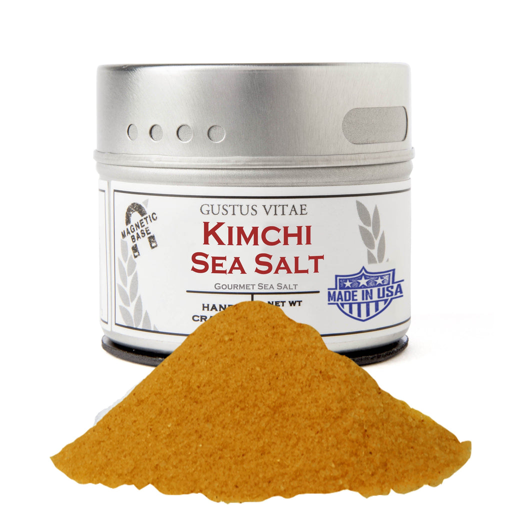 Kimchi sea salt in a round magnetic spice tin with flavorful red gourmet seasoning powder