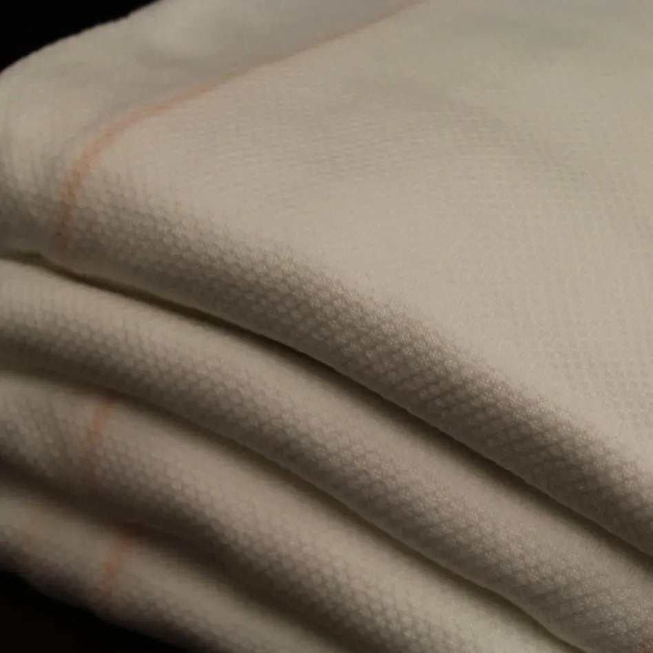 White cotton blend knitted fitted sheet and medical stretcher sheet with ceil blue accents — view 5
