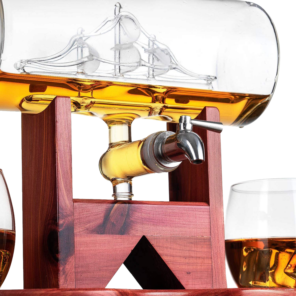 Hand-blown glass whiskey decanter with an antique ship inside, mahogany stand, and two glasses. — view 2