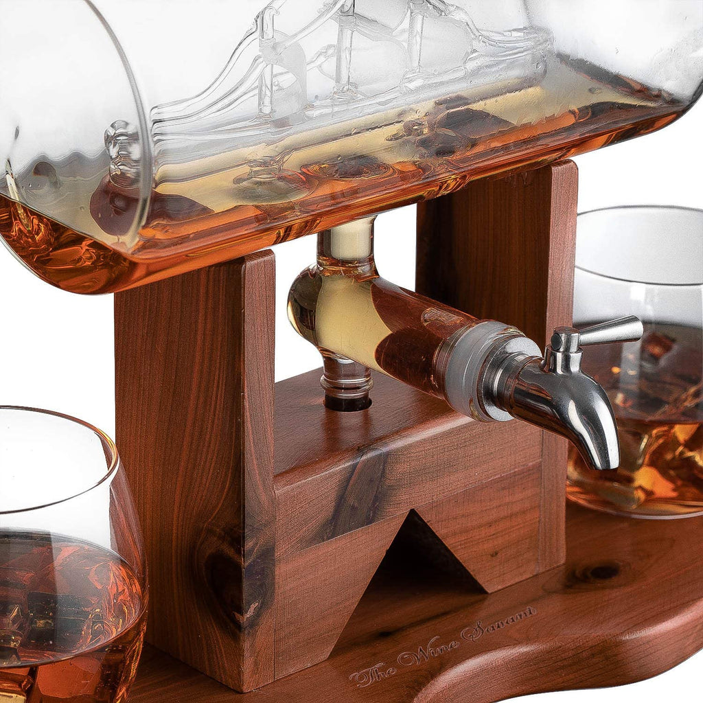 Hand-blown glass whiskey decanter with an antique ship inside, mahogany stand, and two glasses. — view 3