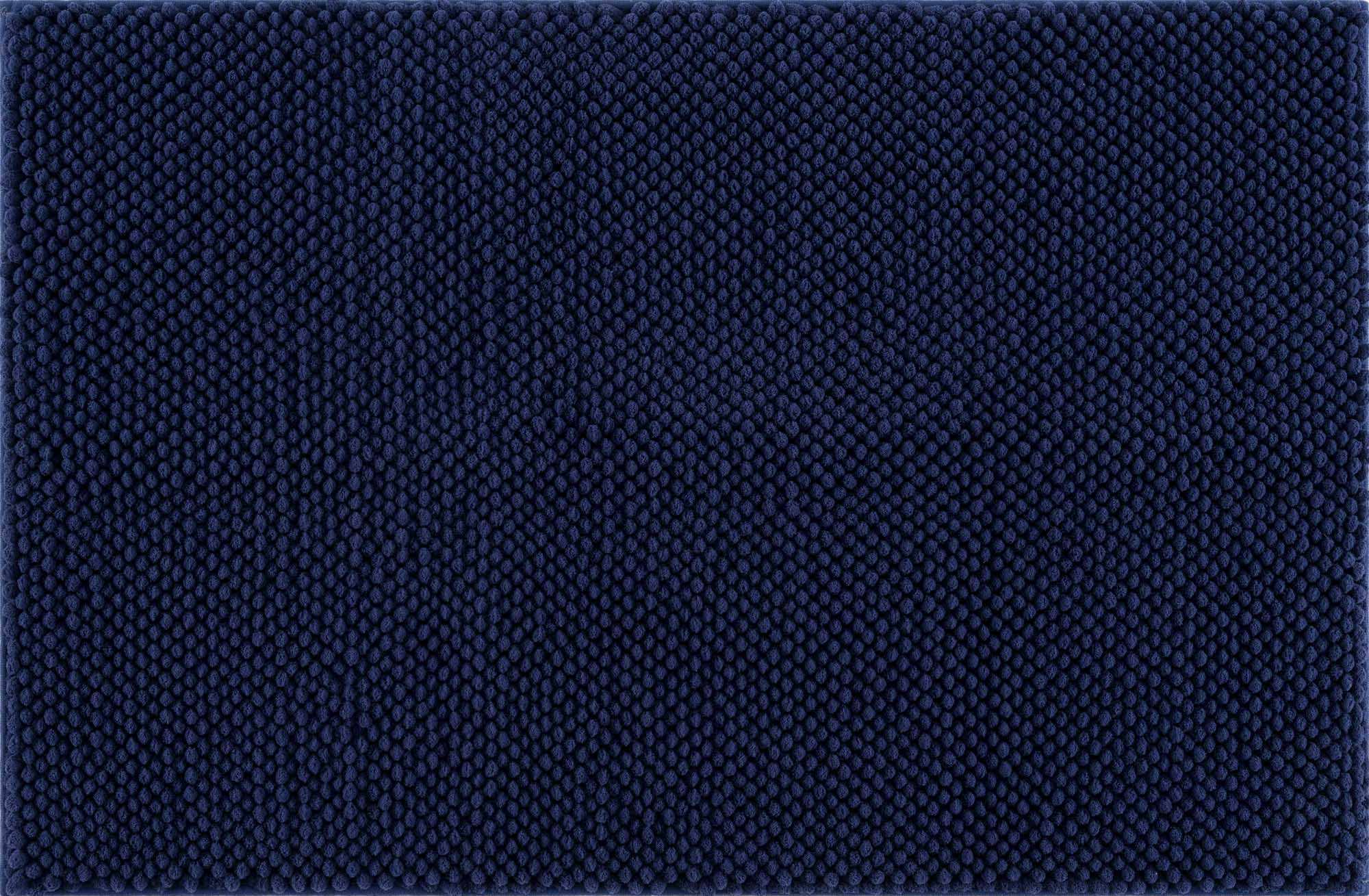 Plush navy blue washable bath mat with thick polyester shag texture on a bathroom floor — view 2