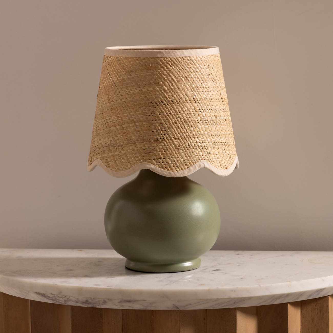 Green solid ceramic table lamp with a beige cotton shade for beautiful home accent lighting
