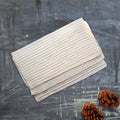 Square bamboo kitchen cloth with textured surface for sustainable eco-friendly dishwashing and household cleaning