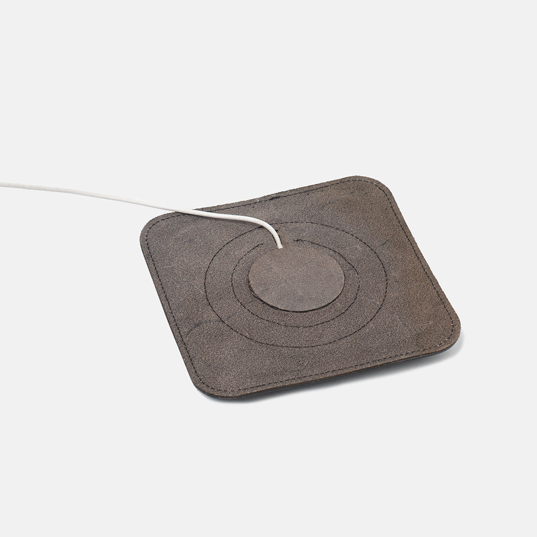 Minimalist Italian leather MagSafe charging rest station pad for smartphone organization — view 3