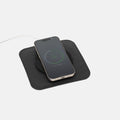 Minimalist Italian leather MagSafe charging rest station pad for smartphone organization