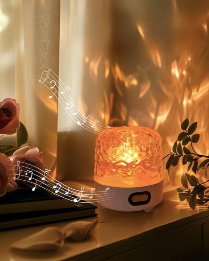 Ambient light projector and bluetooth stereo speaker displaying vibrant aurora colors and water ripples