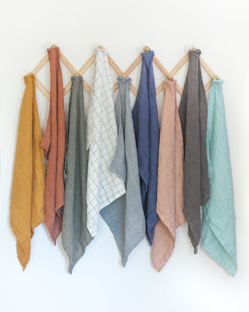 Stone washed linen tea towel folded with hemmed edges and hanging loop, premium European flax — view 4