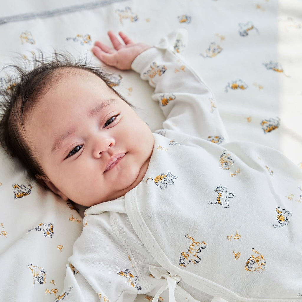 Lively tiger waterproof baby changing mat in white with adorable animal prints — view 2