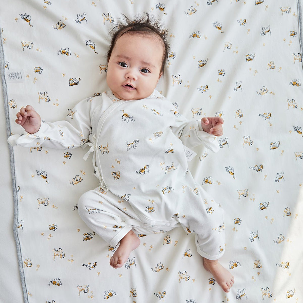 Lively tiger waterproof baby changing mat in white with adorable animal prints — view 3