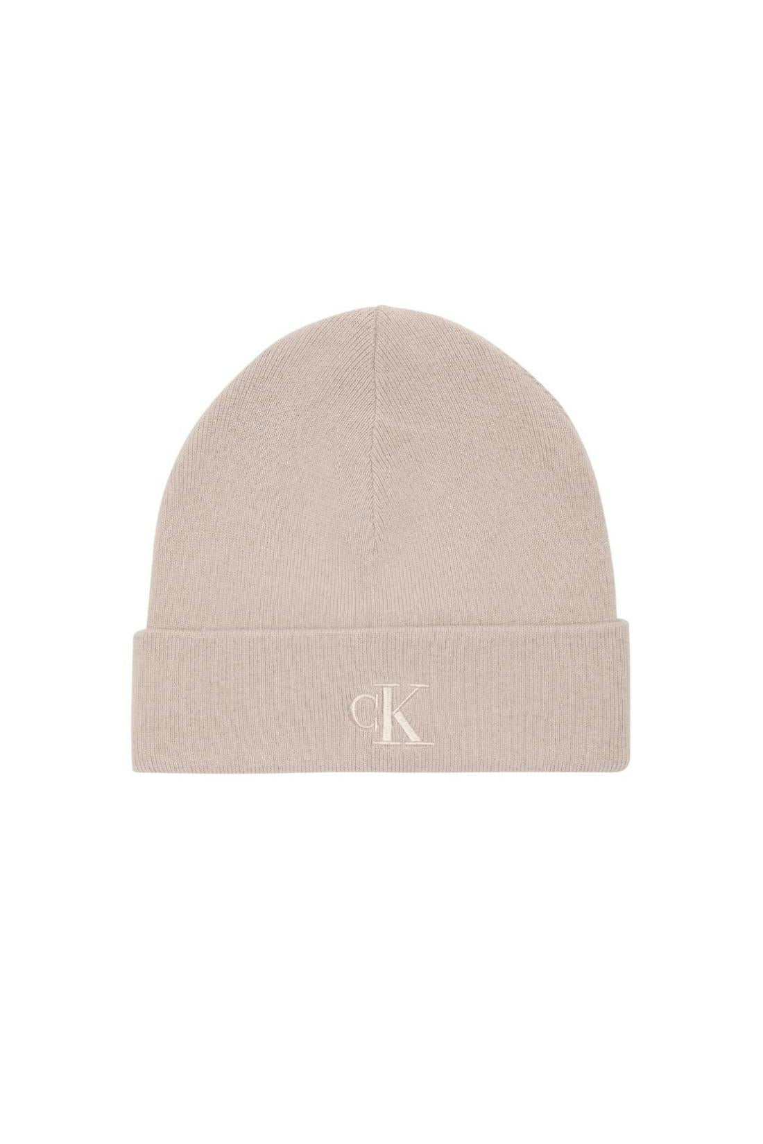 Men's beige knitted beanie hat with fold-over cuff and embroidered monogram logo on the front